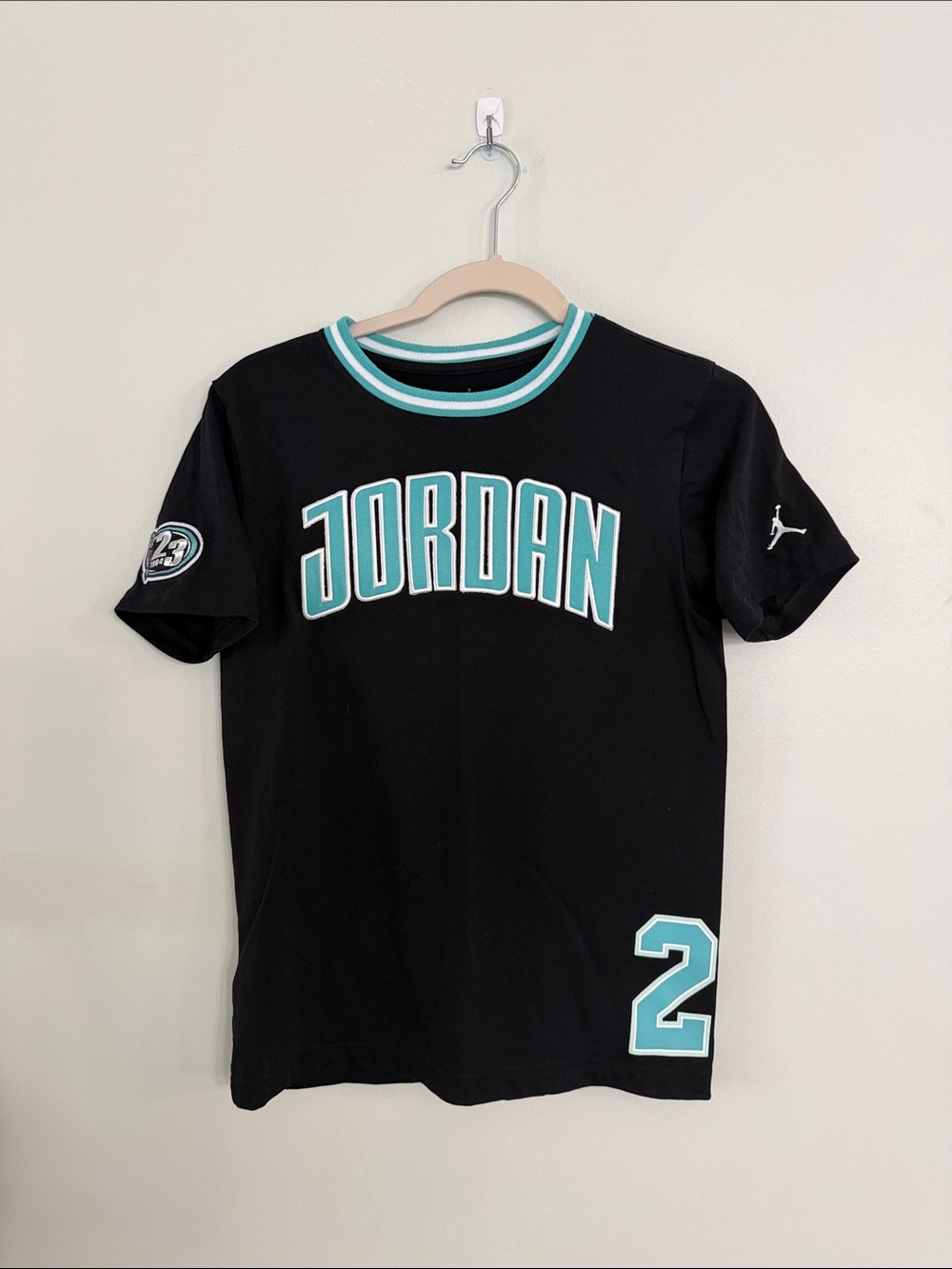 Jordan Black Short Sleeve Shirt with Teal Accents